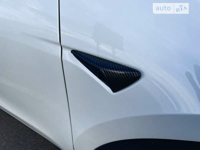 Білий Тесла Model Y, об'ємом двигуна 0 л та пробігом 97 тис. км за 34500 $, фото 24 на Automoto.ua