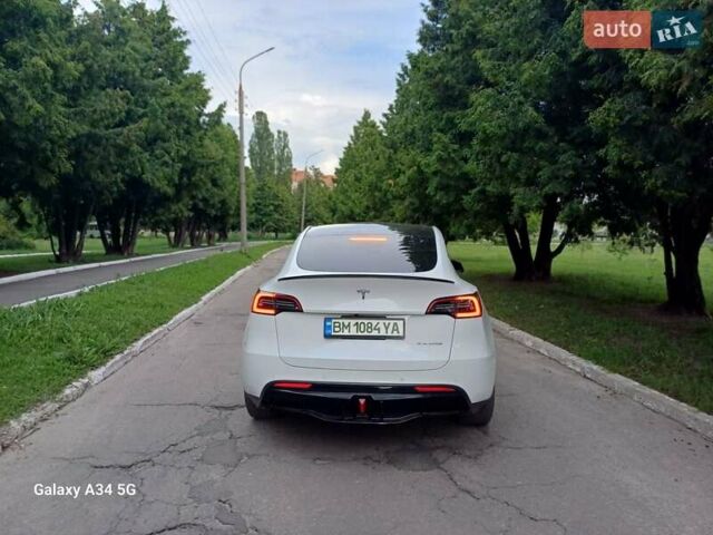 Белый Тесла Model Y, объемом двигателя 0 л и пробегом 67 тыс. км за 23000 $, фото 3 на Automoto.ua