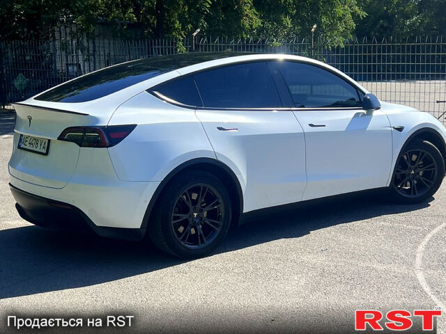 Белый Тесла Model Y, объемом двигателя 0 л и пробегом 63 тыс. км за 26500 $, фото 1 на Automoto.ua