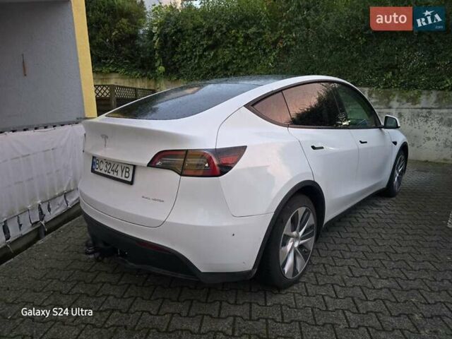 Білий Тесла Model Y, об'ємом двигуна 0 л та пробігом 44 тис. км за 26000 $, фото 1 на Automoto.ua