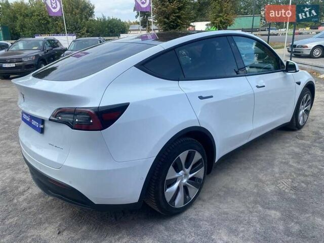 Білий Тесла Model Y, об'ємом двигуна 0 л та пробігом 61 тис. км за 23800 $, фото 4 на Automoto.ua