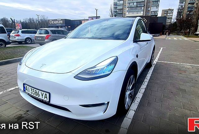 Білий Тесла Model Y, об'ємом двигуна 0 л та пробігом 63 тис. км за 33900 $, фото 4 на Automoto.ua