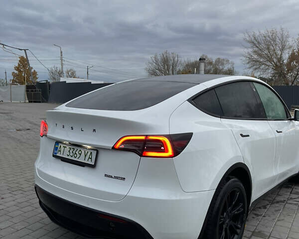 Белый Тесла Model Y, объемом двигателя 0 л и пробегом 55 тыс. км за 28000 $, фото 5 на Automoto.ua