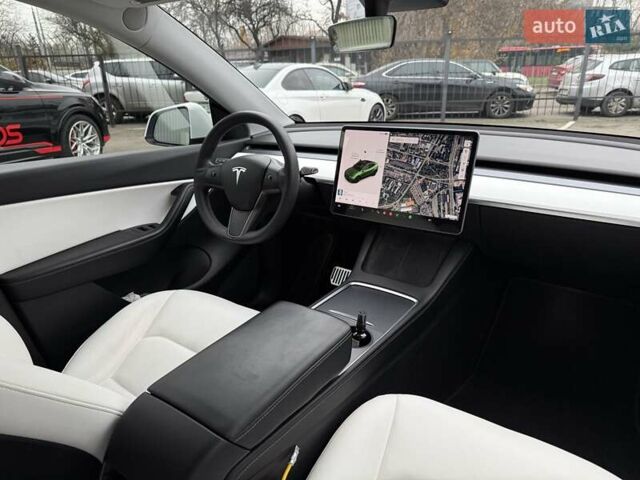 Белый Тесла Model Y, объемом двигателя 0 л и пробегом 80 тыс. км за 25500 $, фото 32 на Automoto.ua