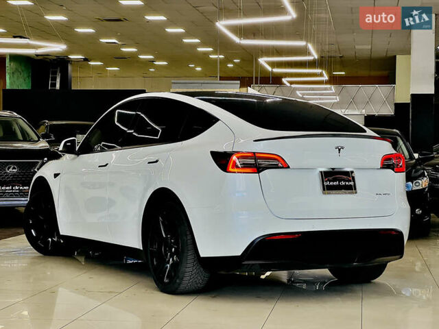 Білий Тесла Model Y, об'ємом двигуна 0 л та пробігом 74 тис. км за 24999 $, фото 6 на Automoto.ua