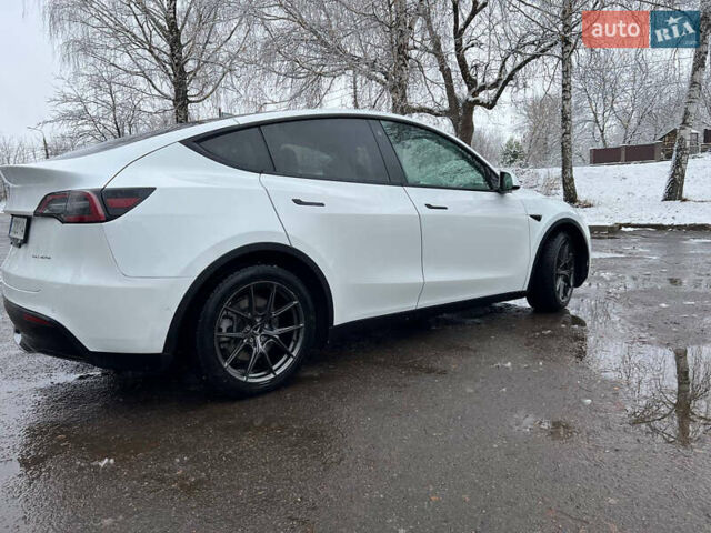 Білий Тесла Model Y, об'ємом двигуна 0 л та пробігом 88 тис. км за 24900 $, фото 2 на Automoto.ua