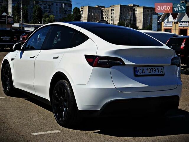 Білий Тесла Model Y, об'ємом двигуна 0 л та пробігом 67 тис. км за 25500 $, фото 3 на Automoto.ua
