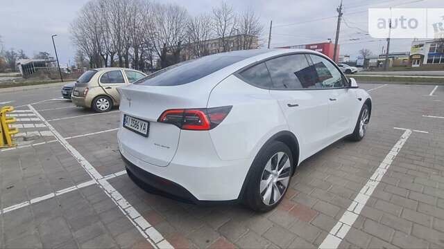 Белый Тесла Model Y, объемом двигателя 0 л и пробегом 63 тыс. км за 33900 $, фото 4 на Automoto.ua