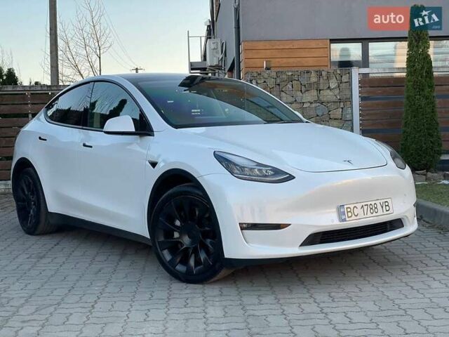 Белый Тесла Model Y, объемом двигателя 0 л и пробегом 56 тыс. км за 24980 $, фото 2 на Automoto.ua