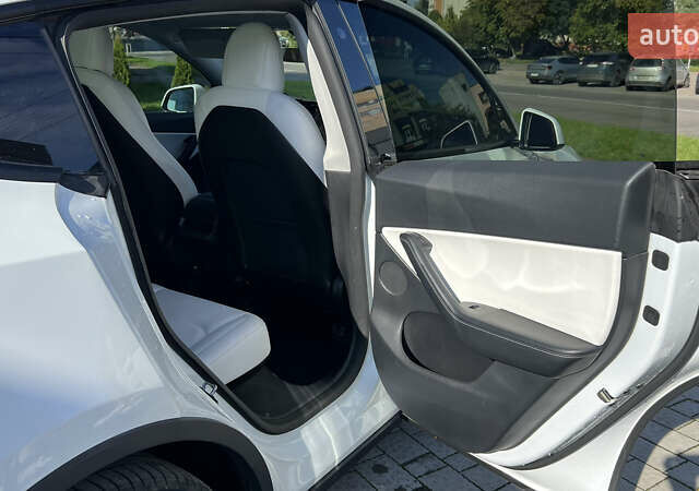 Белый Тесла Model Y, объемом двигателя 0 л и пробегом 88 тыс. км за 25700 $, фото 27 на Automoto.ua