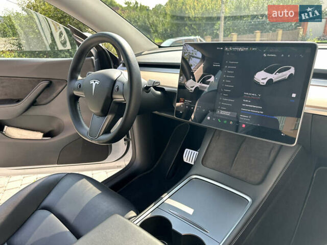 Білий Тесла Model Y, об'ємом двигуна 0 л та пробігом 70 тис. км за 26700 $, фото 22 на Automoto.ua