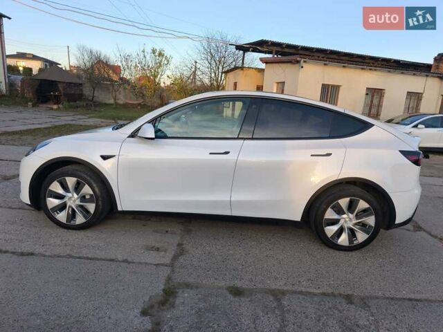 Білий Тесла Model Y, об'ємом двигуна 0 л та пробігом 86 тис. км за 25300 $, фото 1 на Automoto.ua