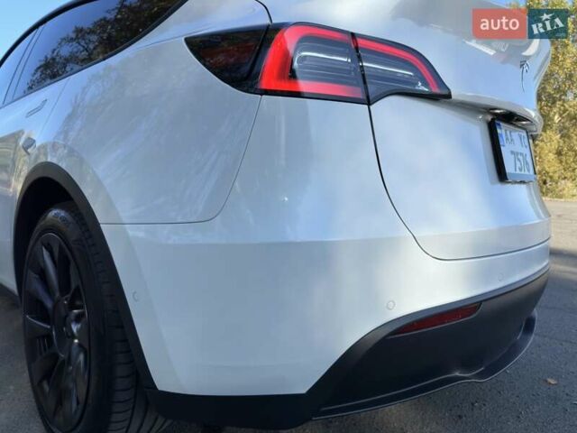 Білий Тесла Model Y, об'ємом двигуна 0 л та пробігом 73 тис. км за 29400 $, фото 16 на Automoto.ua
