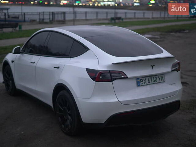 Білий Тесла Model Y, об'ємом двигуна 0 л та пробігом 66 тис. км за 23500 $, фото 56 на Automoto.ua