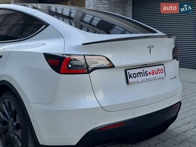 Белый Тесла Model Y, объемом двигателя 0 л и пробегом 98 тыс. км за 26499 $, фото 57 на Automoto.ua