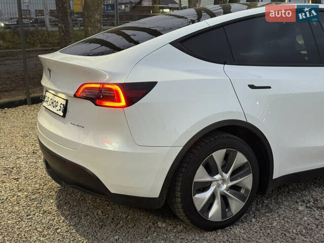 Белый Тесла Model Y, объемом двигателя 0 л и пробегом 128 тыс. км за 22600 $, фото 20 на Automoto.ua