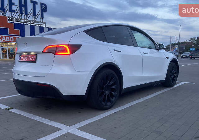 Белый Тесла Model Y, объемом двигателя 0 л и пробегом 81 тыс. км за 25000 $, фото 3 на Automoto.ua