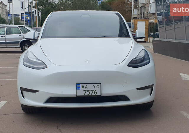 Білий Тесла Model Y, об'ємом двигуна 0 л та пробігом 74 тис. км за 25900 $, фото 2 на Automoto.ua