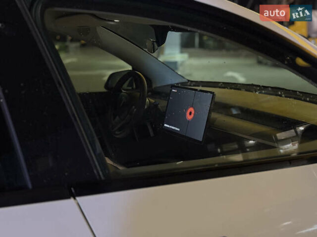 Белый Тесла Model Y, объемом двигателя 0 л и пробегом 58 тыс. км за 26250 $, фото 6 на Automoto.ua