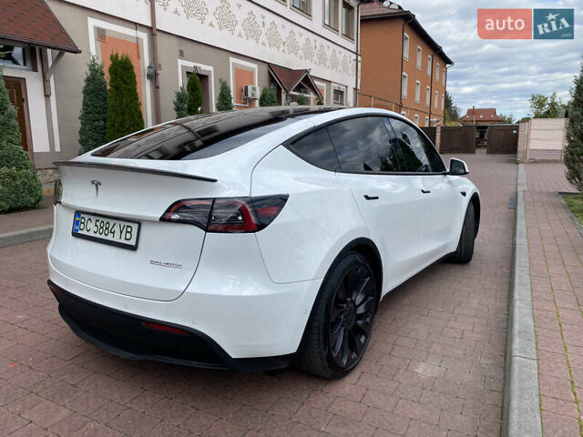Белый Тесла Model Y, объемом двигателя 0 л и пробегом 130 тыс. км за 23000 $, фото 20 на Automoto.ua