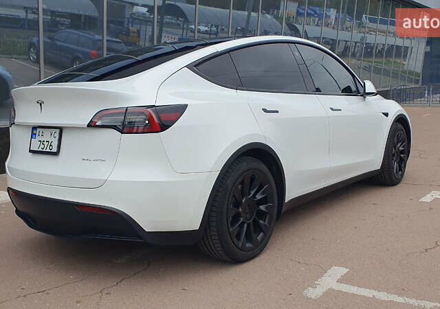Білий Тесла Model Y, об'ємом двигуна 0 л та пробігом 74 тис. км за 25900 $, фото 3 на Automoto.ua