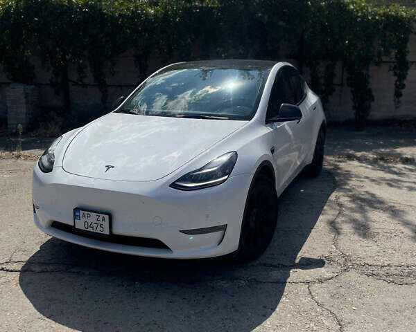 Тесла Model Y 2021 в Запорожье на Automoto.ua Белый Тесла Model Y, объемом двигателя 0 л и пробегом 84 тыс. км за 22000 $, фото 2 на Automoto.ua