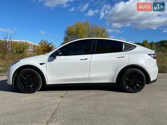 Белый Тесла Model Y, объемом двигателя 0 л и пробегом 90 тыс. км за 27500 $, фото 1 на Automoto.ua
