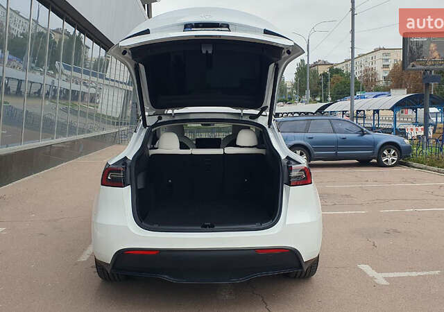 Білий Тесла Model Y, об'ємом двигуна 0 л та пробігом 74 тис. км за 25900 $, фото 21 на Automoto.ua