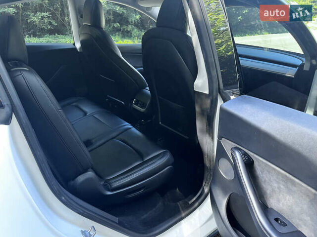 Білий Тесла Model Y, об'ємом двигуна 0 л та пробігом 117 тис. км за 23000 $, фото 22 на Automoto.ua