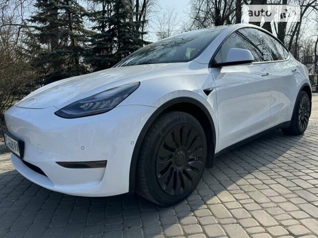 Белый Тесла Model Y, объемом двигателя 0 л и пробегом 56 тыс. км за 40500 $, фото 5 на Automoto.ua