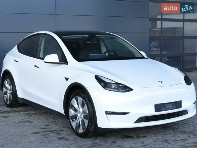 Белый Тесла Model Y, объемом двигателя 0 л и пробегом 71 тыс. км за 23000 $, фото 1 на Automoto.ua