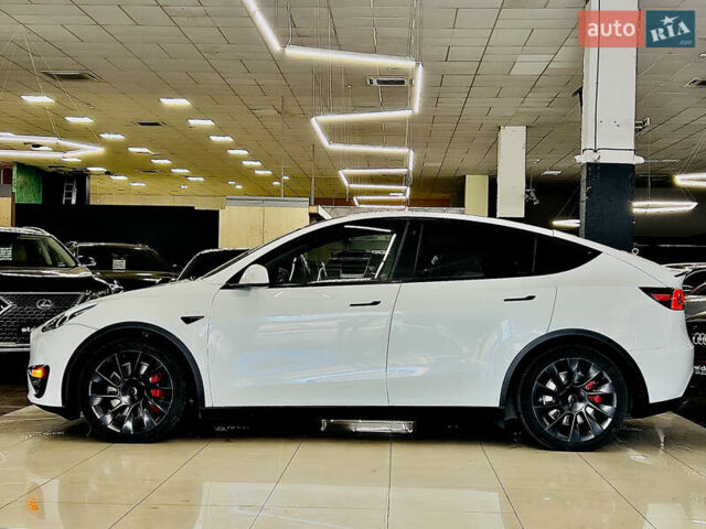 Білий Тесла Model Y, об'ємом двигуна 0 л та пробігом 74 тис. км за 24979 $, фото 7 на Automoto.ua