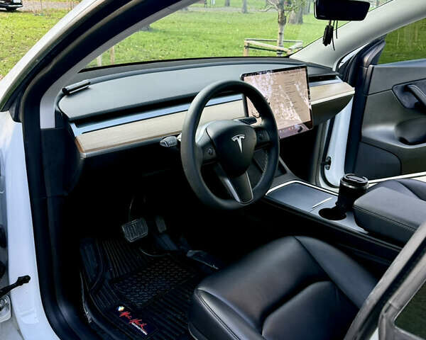 Белый Тесла Model Y, объемом двигателя 0 л и пробегом 99 тыс. км за 25499 $, фото 6 на Automoto.ua