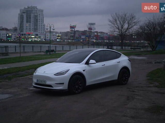 Білий Тесла Model Y, об'ємом двигуна 0 л та пробігом 66 тис. км за 23500 $, фото 27 на Automoto.ua