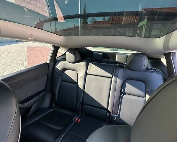 Тесла Model Y 2021 в Киеве на Automoto.ua Белый Тесла Model Y, объемом двигателя 0 л и пробегом 51 тыс. км за 27500 $, фото 11 на Automoto.ua