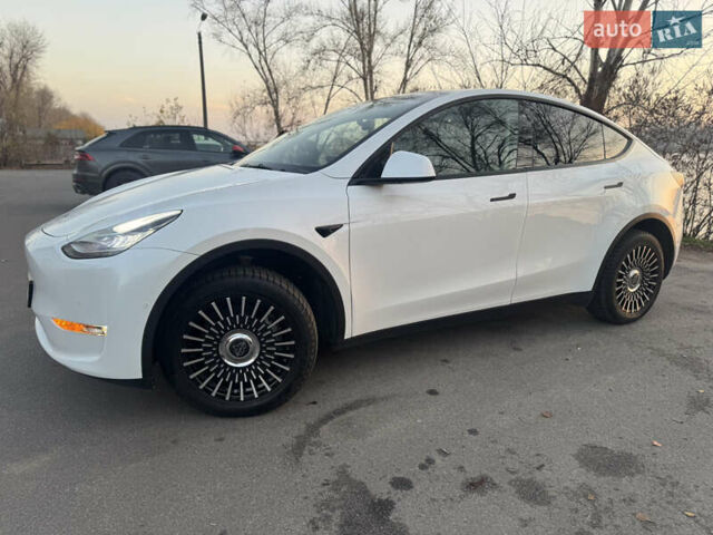 Білий Тесла Model Y, об'ємом двигуна 0 л та пробігом 55 тис. км за 24990 $, фото 1 на Automoto.ua
