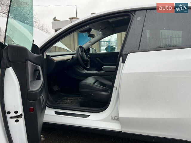 Білий Тесла Model Y, об'ємом двигуна 0 л та пробігом 88 тис. км за 24900 $, фото 36 на Automoto.ua