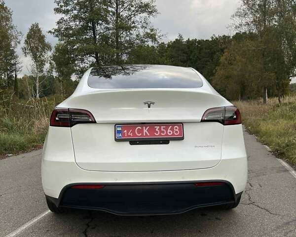Белый Тесла Model Y, объемом двигателя 0 л и пробегом 87 тыс. км за 25100 $, фото 7 на Automoto.ua