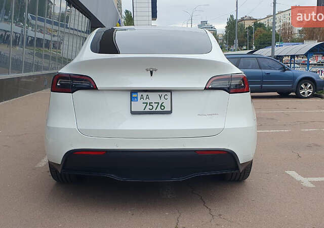 Білий Тесла Model Y, об'ємом двигуна 0 л та пробігом 74 тис. км за 25900 $, фото 5 на Automoto.ua