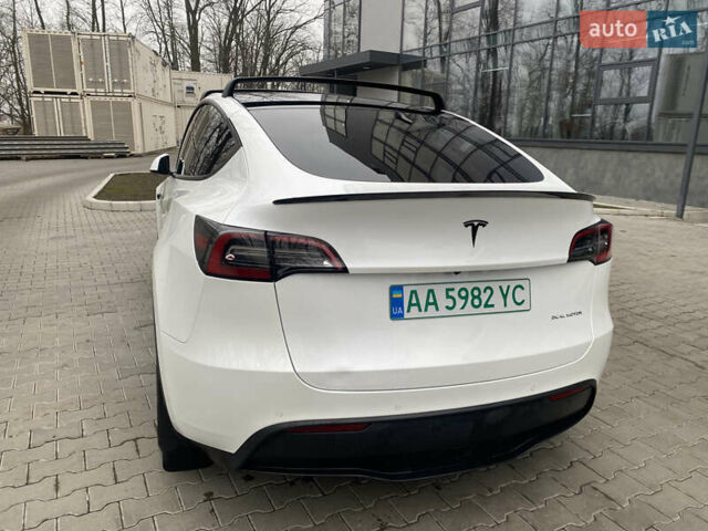 Белый Тесла Model Y, объемом двигателя 0 л и пробегом 52 тыс. км за 26500 $, фото 2 на Automoto.ua