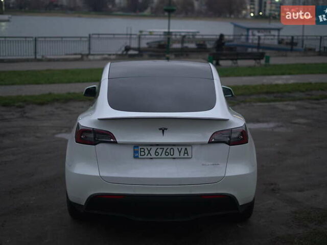 Білий Тесла Model Y, об'ємом двигуна 0 л та пробігом 66 тис. км за 23500 $, фото 62 на Automoto.ua