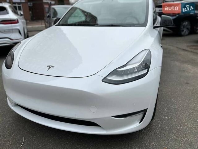 Білий Тесла Model Y, об'ємом двигуна 0 л та пробігом 47 тис. км за 23499 $, фото 26 на Automoto.ua