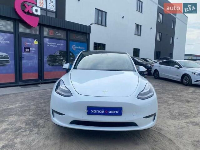 Білий Тесла Model Y, об'ємом двигуна 0 л та пробігом 61 тис. км за 23800 $, фото 1 на Automoto.ua