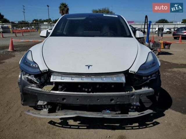 Білий Тесла Model Y, об'ємом двигуна 0 л та пробігом 73 тис. км за 29400 $, фото 51 на Automoto.ua
