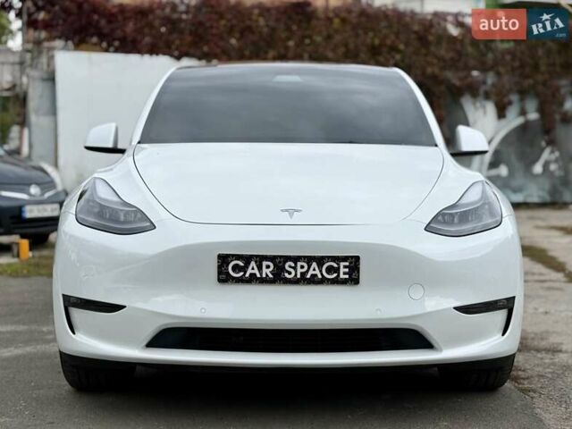 Белый Тесла Model Y, объемом двигателя 0 л и пробегом 88 тыс. км за 26999 $, фото 3 на Automoto.ua