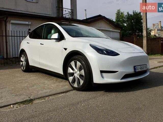 Белый Тесла Model Y, объемом двигателя 0 л и пробегом 67 тыс. км за 27000 $, фото 3 на Automoto.ua