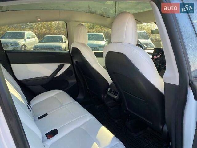 Білий Тесла Model Y, об'ємом двигуна 0 л та пробігом 54 тис. км за 21900 $, фото 20 на Automoto.ua