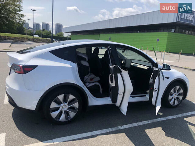 Белый Тесла Model Y, объемом двигателя 0 л и пробегом 55 тыс. км за 24500 $, фото 6 на Automoto.ua