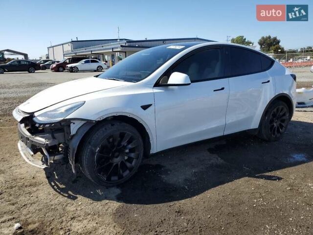 Білий Тесла Model Y, об'ємом двигуна 0 л та пробігом 73 тис. км за 29400 $, фото 49 на Automoto.ua
