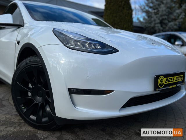 Белый Тесла Model Y, объемом двигателя 82 л и пробегом 78 тыс. км за 26900 $, фото 19 на Automoto.ua